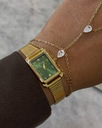 L'ÉMERAUDE MONTRE DORÉ AVEC CHIFFRES ARABES Shilaya