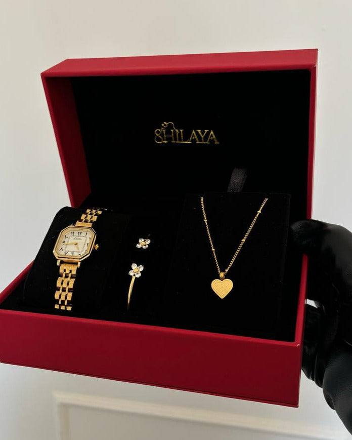 THE MIDNIGHT GOLD WATCH WITH ARABIC NUMERALS
