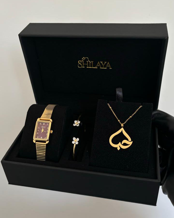 THE MIDNIGHT GOLD WATCH WITH ARABIC NUMERALS