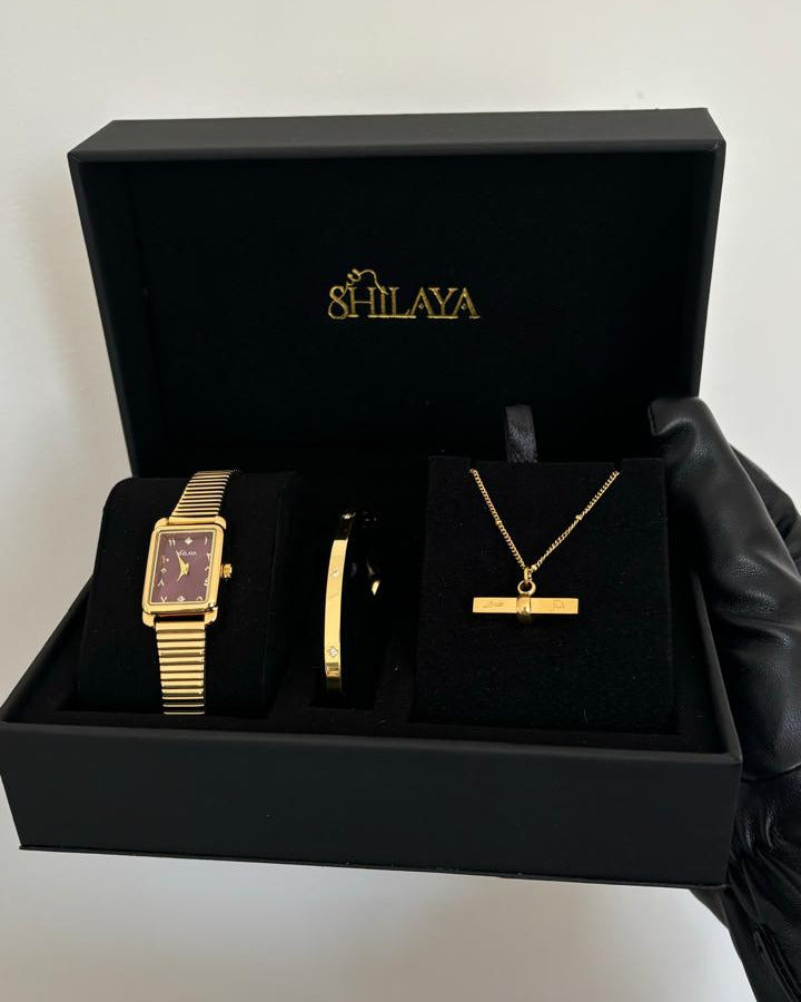 THE MIDNIGHT GOLD WATCH WITH ARABIC NUMERALS
