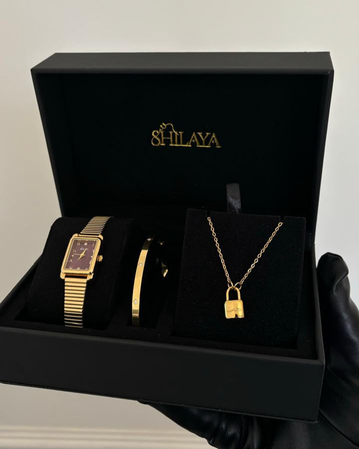 THE MIDNIGHT GOLD WATCH WITH ARABIC NUMERALS