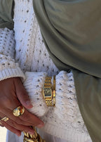 THE CLASSIC GOLD WATCH WITH ARABIC NUMERALS