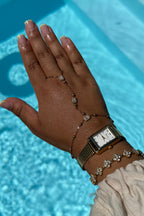 THE CLASSIC GOLD WATCH WITH ARABIC NUMERALS