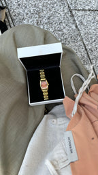 THE CLASSIC GOLD WATCH WITH ARABIC NUMERALS