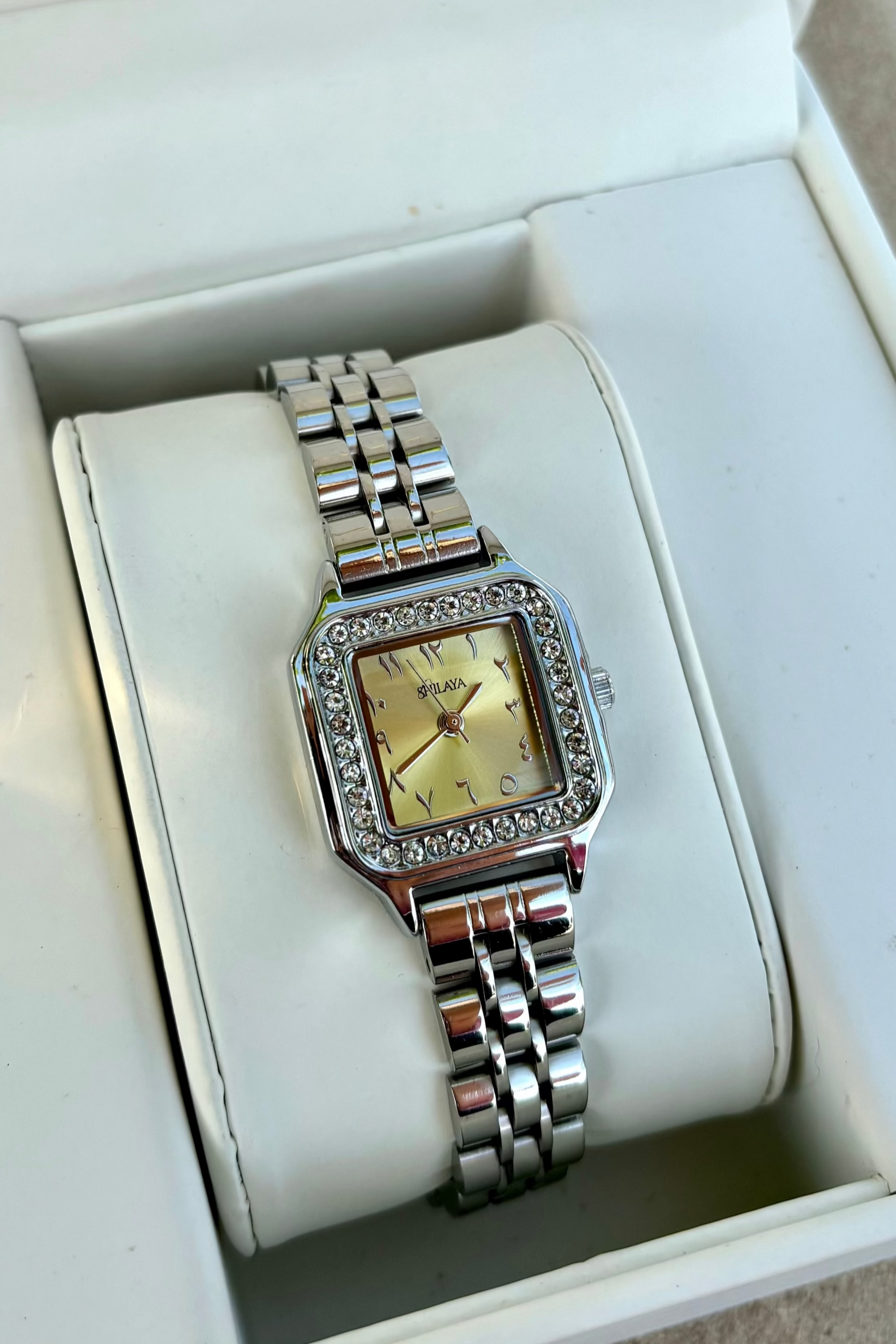 THE MIDNIGHT GOLD WATCH WITH ARABIC NUMERALS