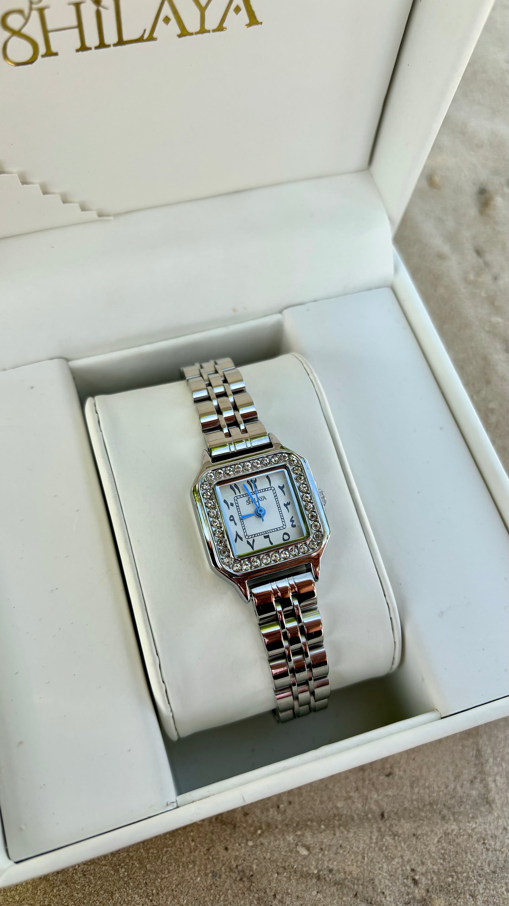 THE MIDNIGHT GOLD WATCH WITH ARABIC NUMERALS