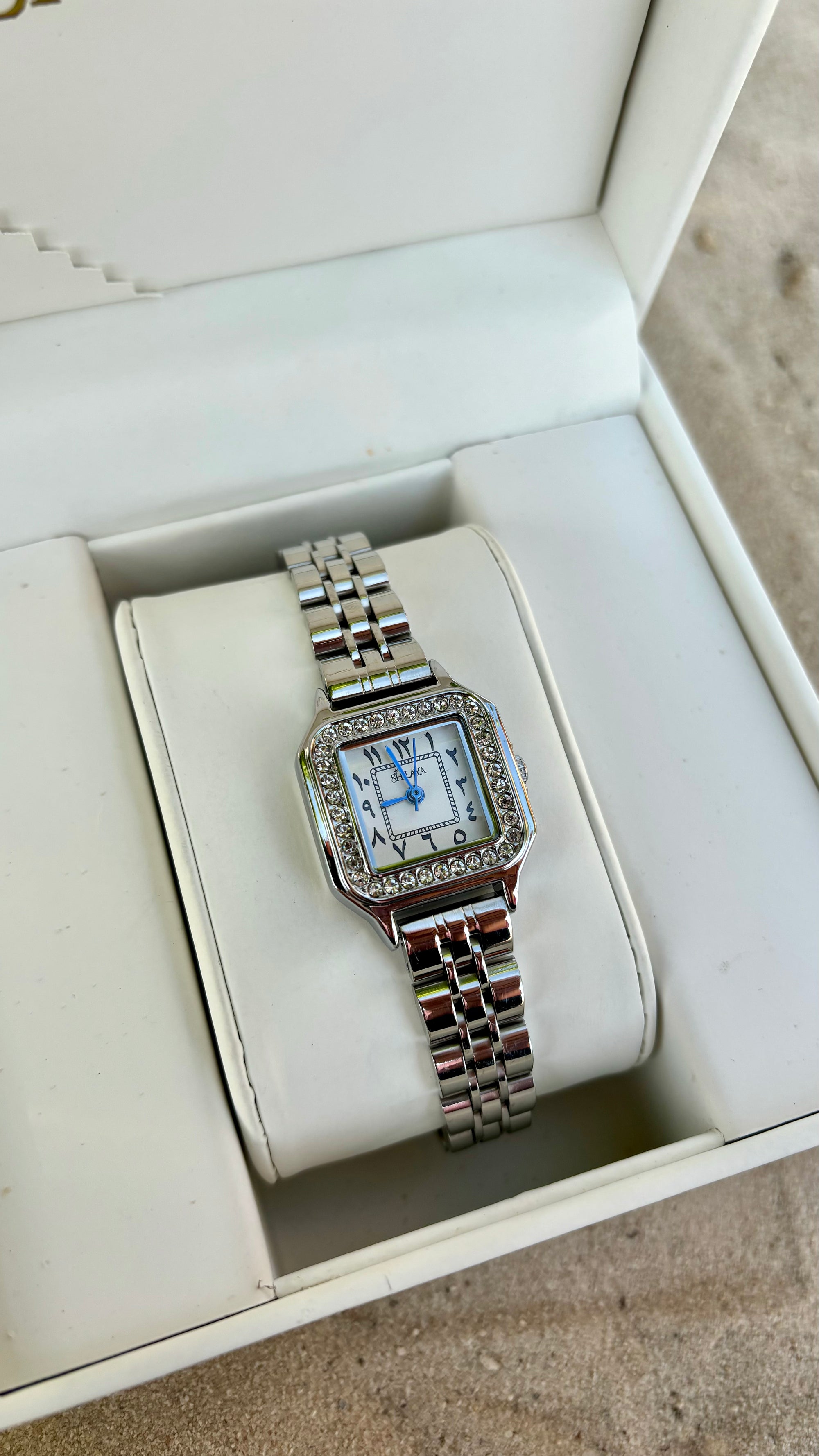 THE MIDNIGHT GOLD WATCH WITH ARABIC NUMERALS