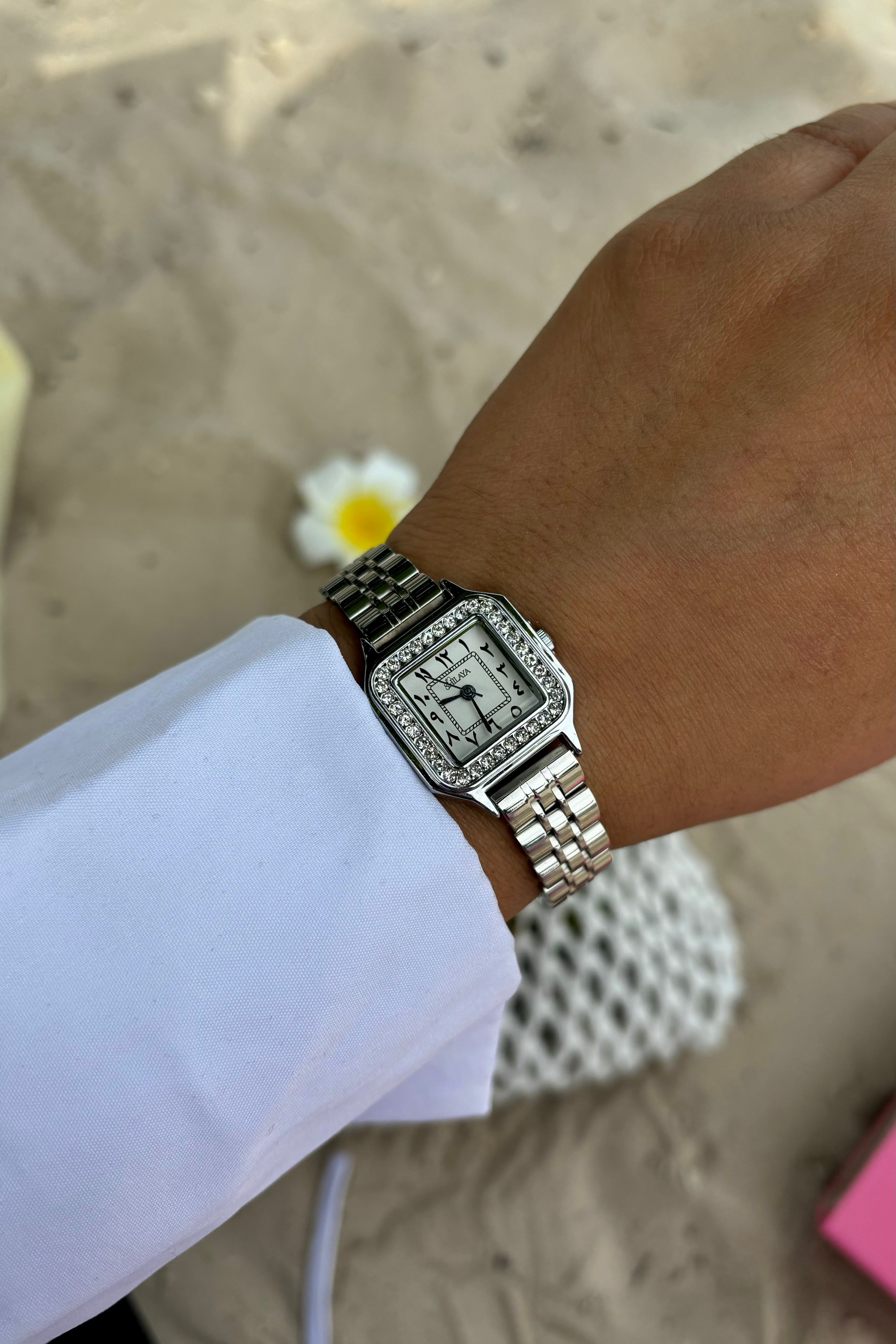 THE MIDNIGHT GOLD WATCH WITH ARABIC NUMERALS