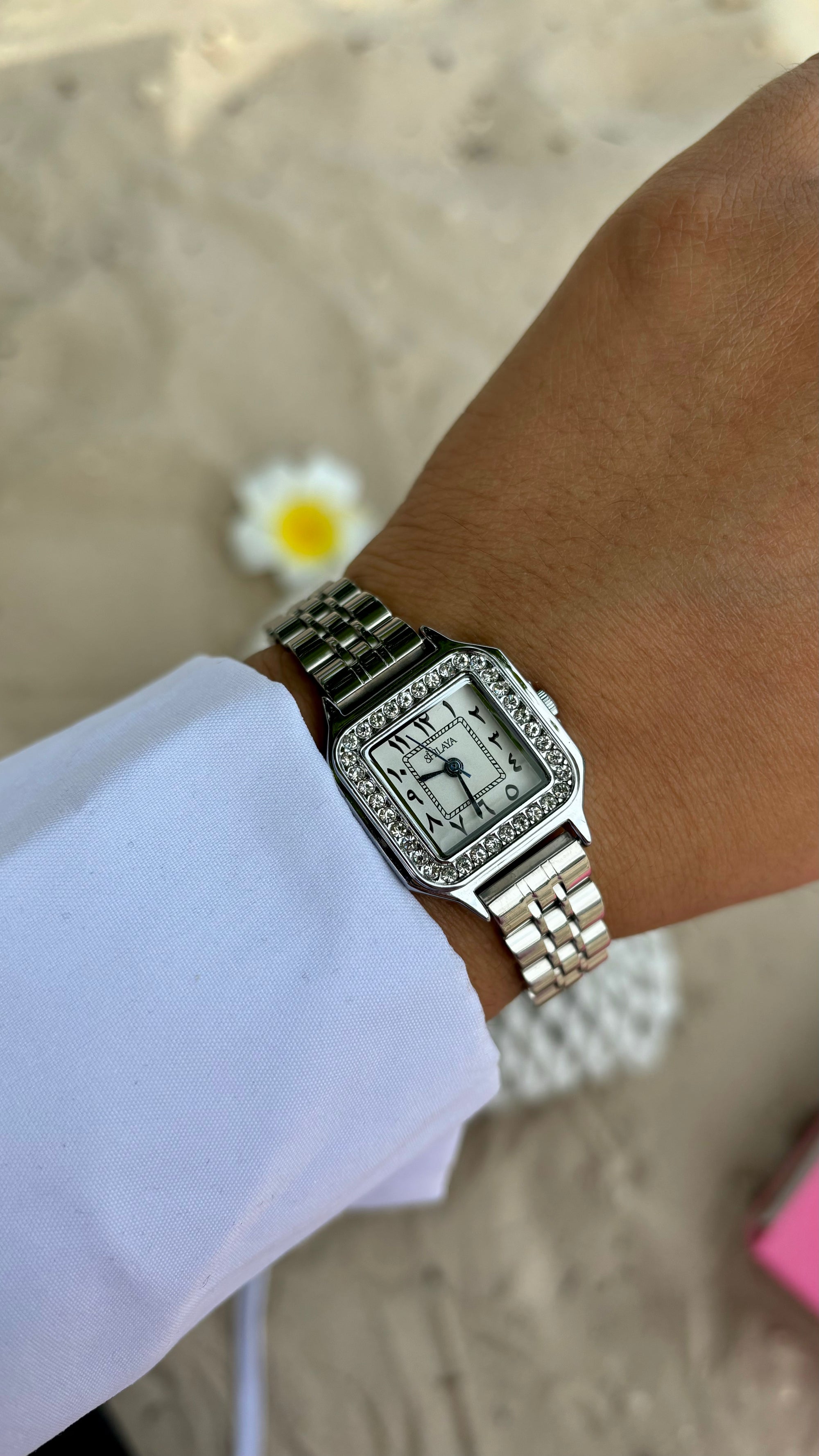 THE MIDNIGHT GOLD WATCH WITH ARABIC NUMERALS
