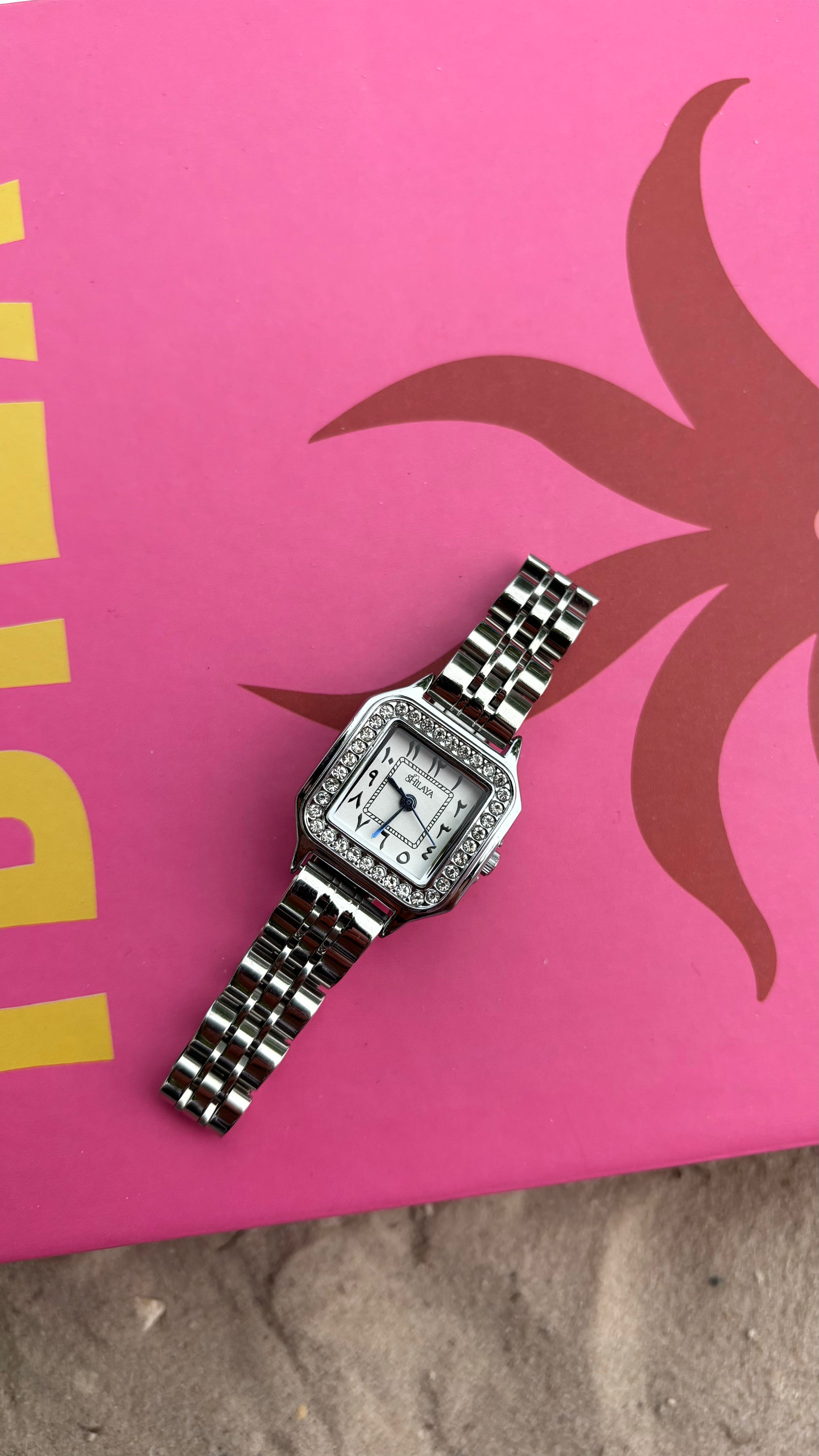THE MIDNIGHT GOLD WATCH WITH ARABIC NUMERALS
