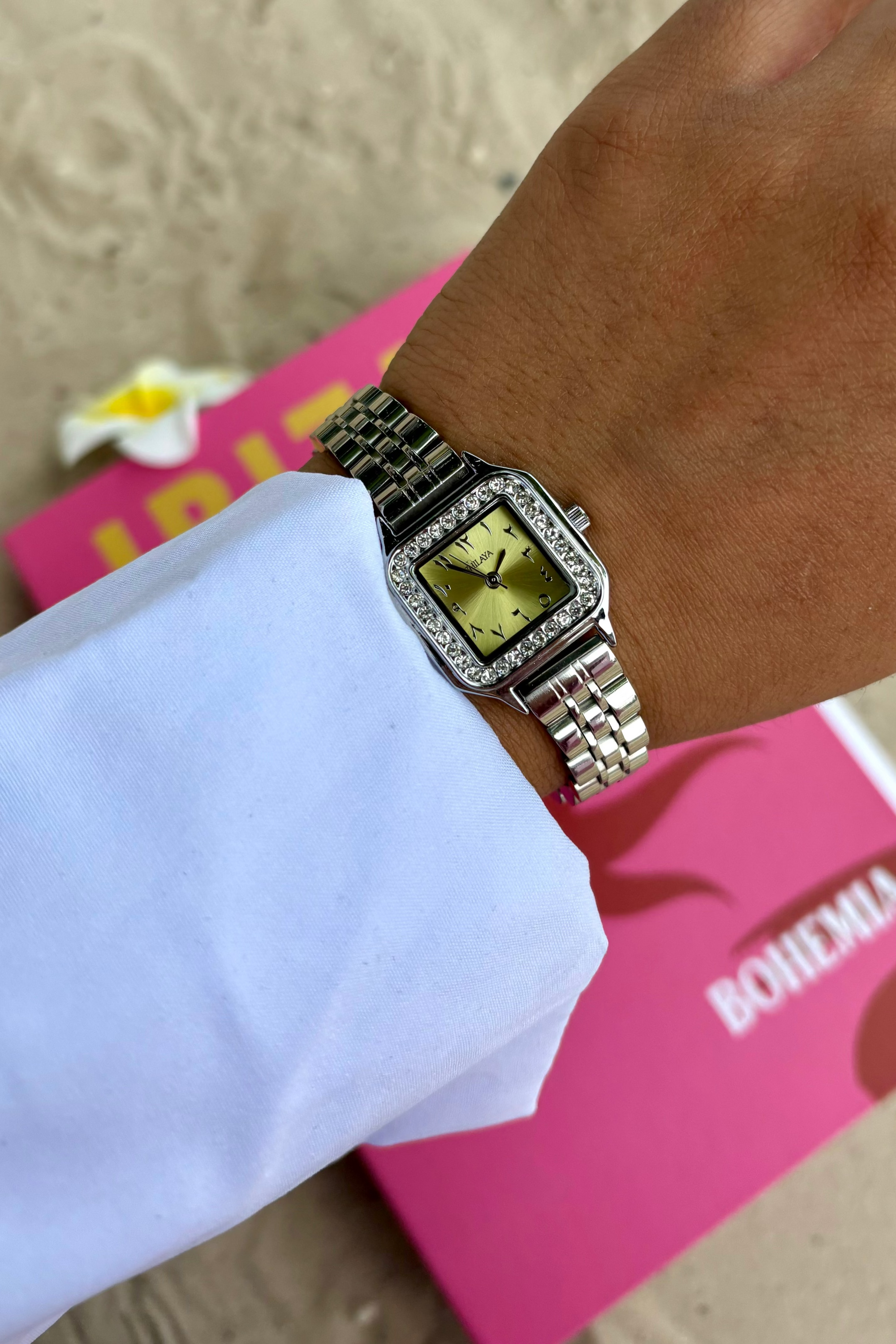 THE MIDNIGHT GOLD WATCH WITH ARABIC NUMERALS