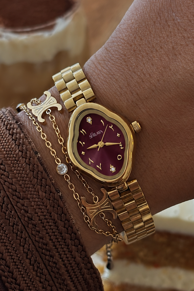 LA MUSE PURPLE MONTRE DORÉ AVEC CHIFFRES ARABES