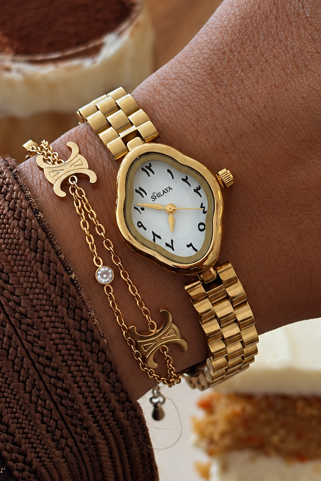 LA MUSE WHITE MONTRE DORÉ AVEC CHIFFRES ARABES