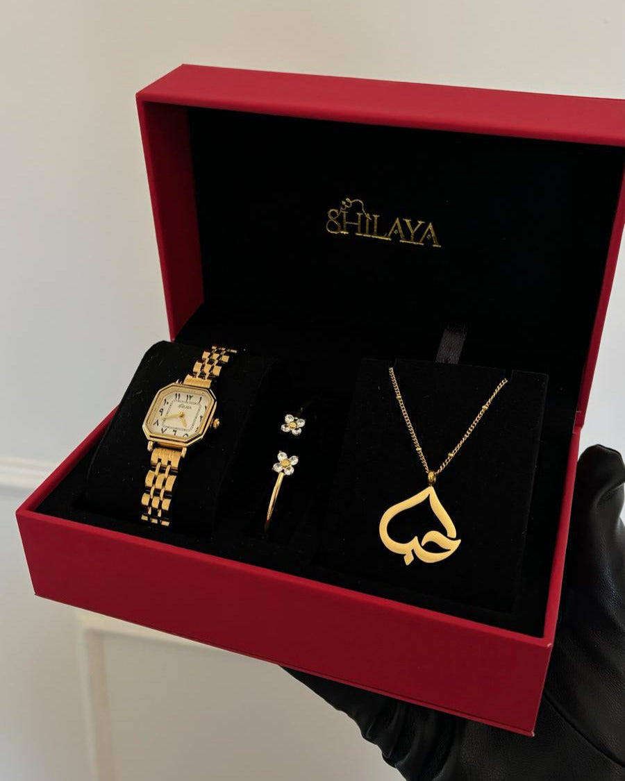 THE MIDNIGHT GOLD WATCH WITH ARABIC NUMERALS