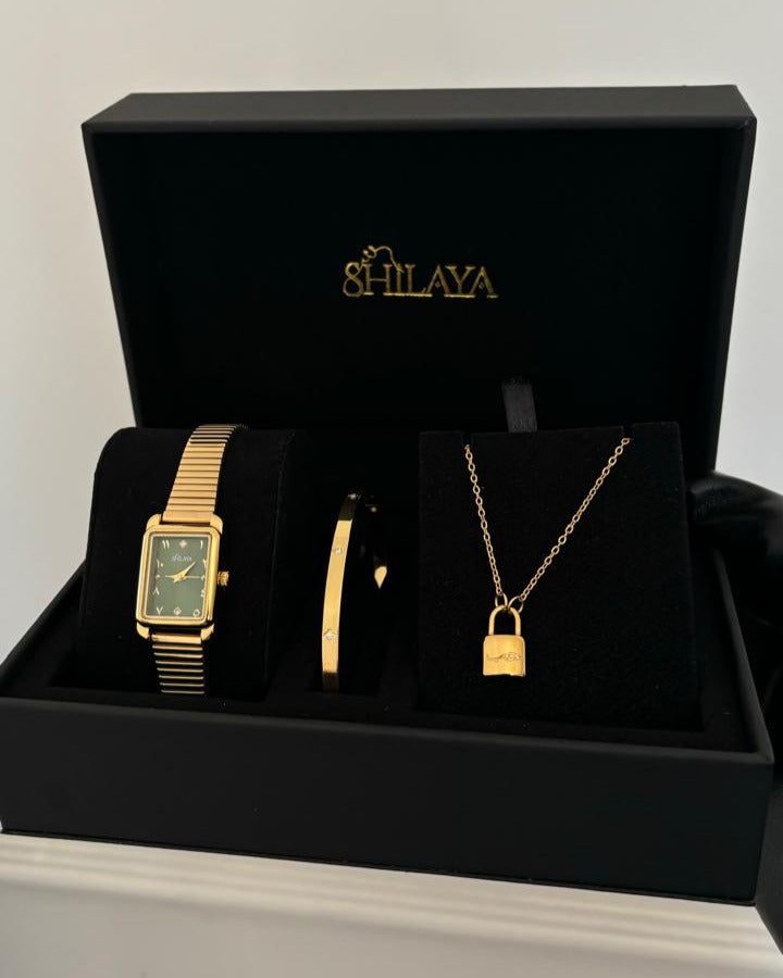 THE MIDNIGHT GOLD WATCH WITH ARABIC NUMERALS