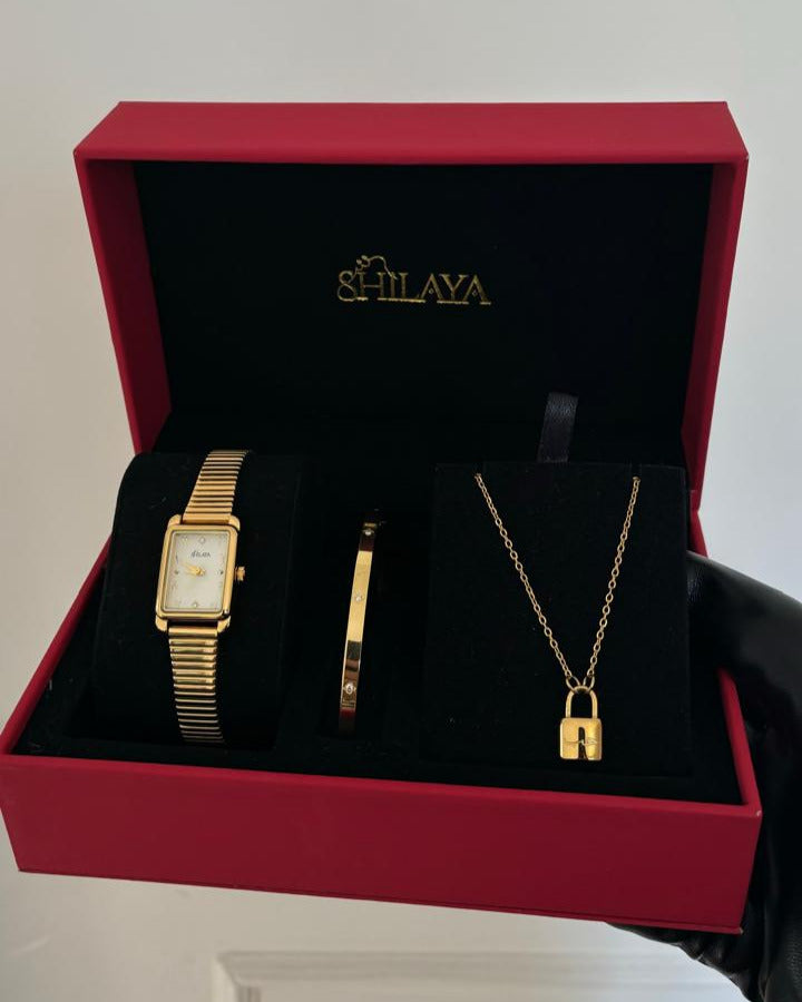 THE MIDNIGHT GOLD WATCH WITH ARABIC NUMERALS