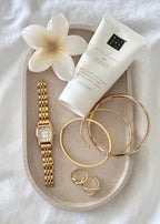 THE CLASSIC GOLD WATCH WITH ARABIC NUMERALS